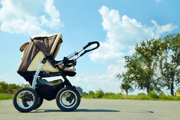 naps on the go - image of a stroller in the middle of a path
