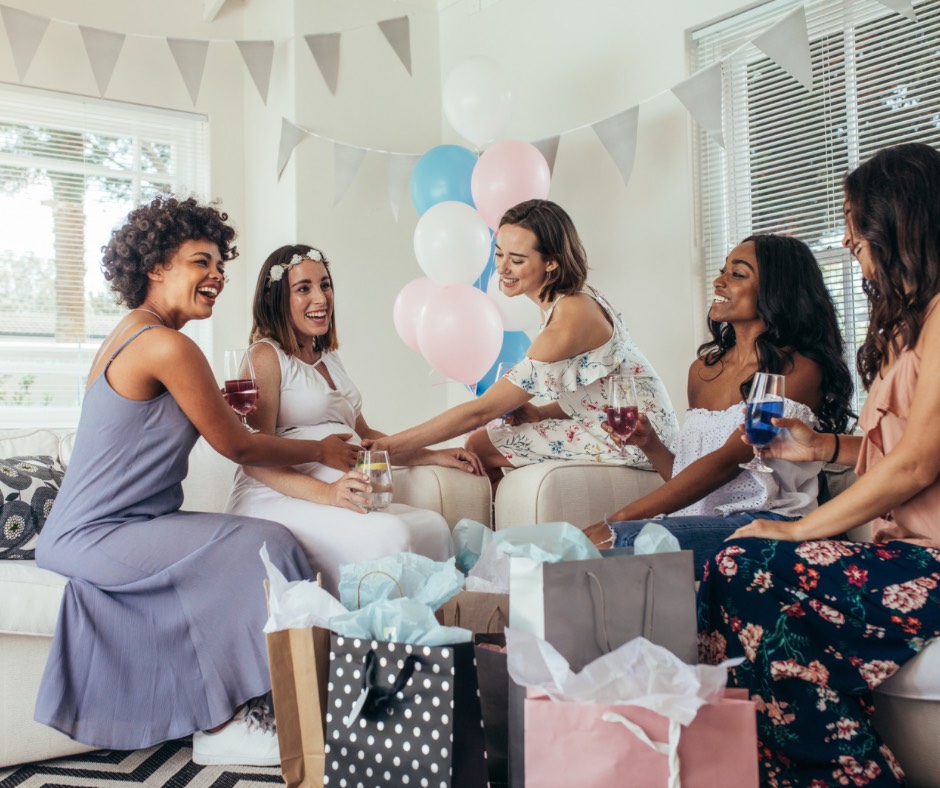 baby registry items for safe sleep - photo of a group of people with long hair in dresses opening presents